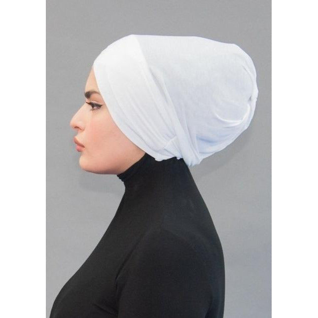 Criss Cross Cap- Snowy White - Modestia Collection is a Detroit scarf based brand with a curated for Detroiter's and to the eclectic style of scarf lovers around the globe.