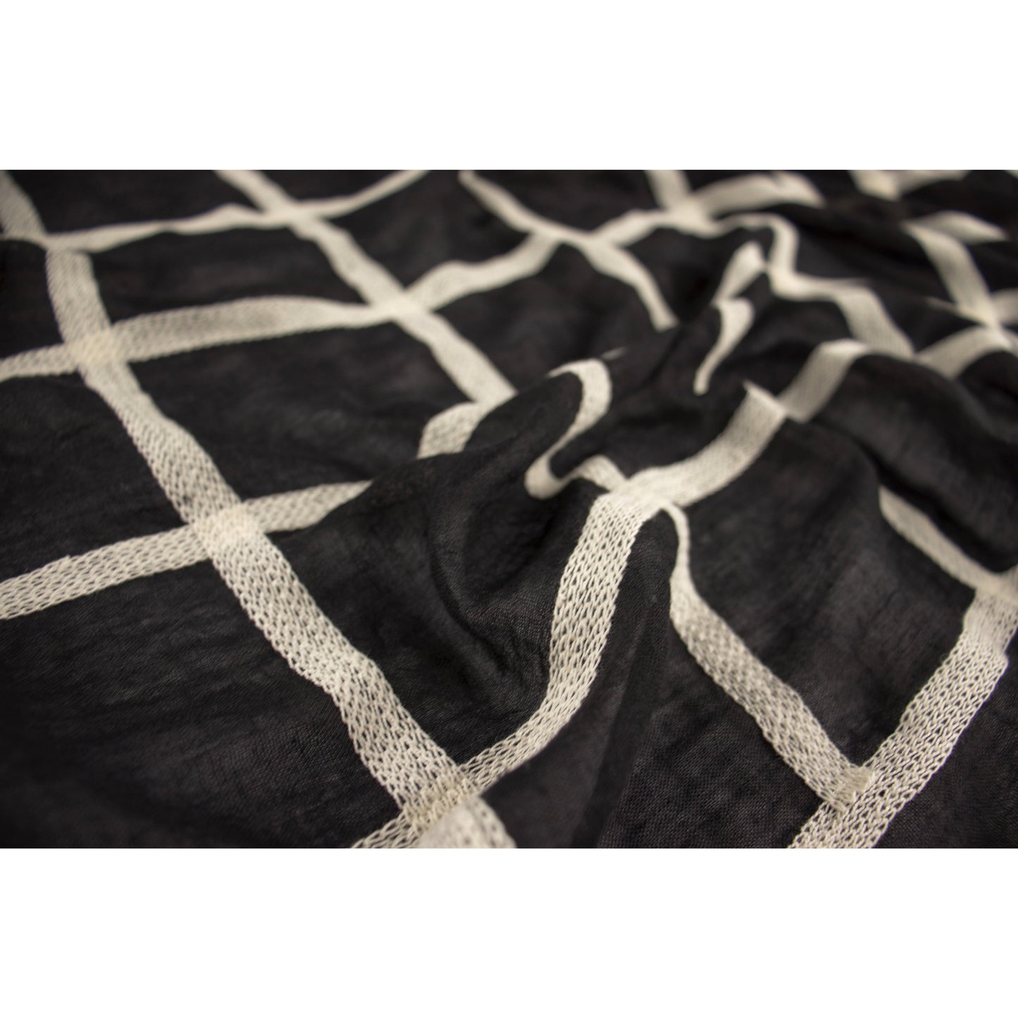 Grid - Modestia Collection is a scarf brand with a higher purpose, representing the eclectic style of a diverse and inclusive community of scarf lovers.