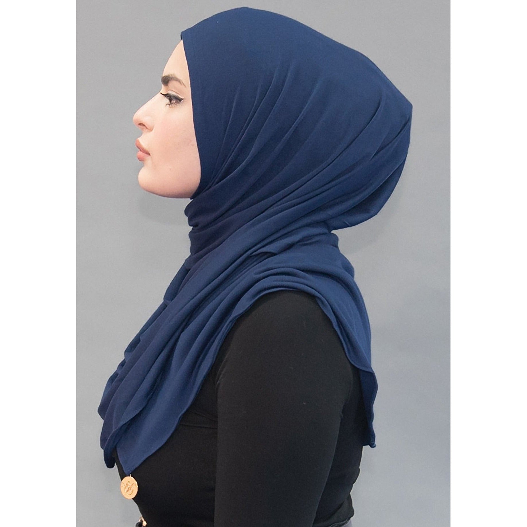 One Step Jersey Hijabs- Deep Sea Navy - Modestia Collection is a Detroit scarf based brand with a curated for Detroiter's and to the eclectic style of scarf lovers around the globe.