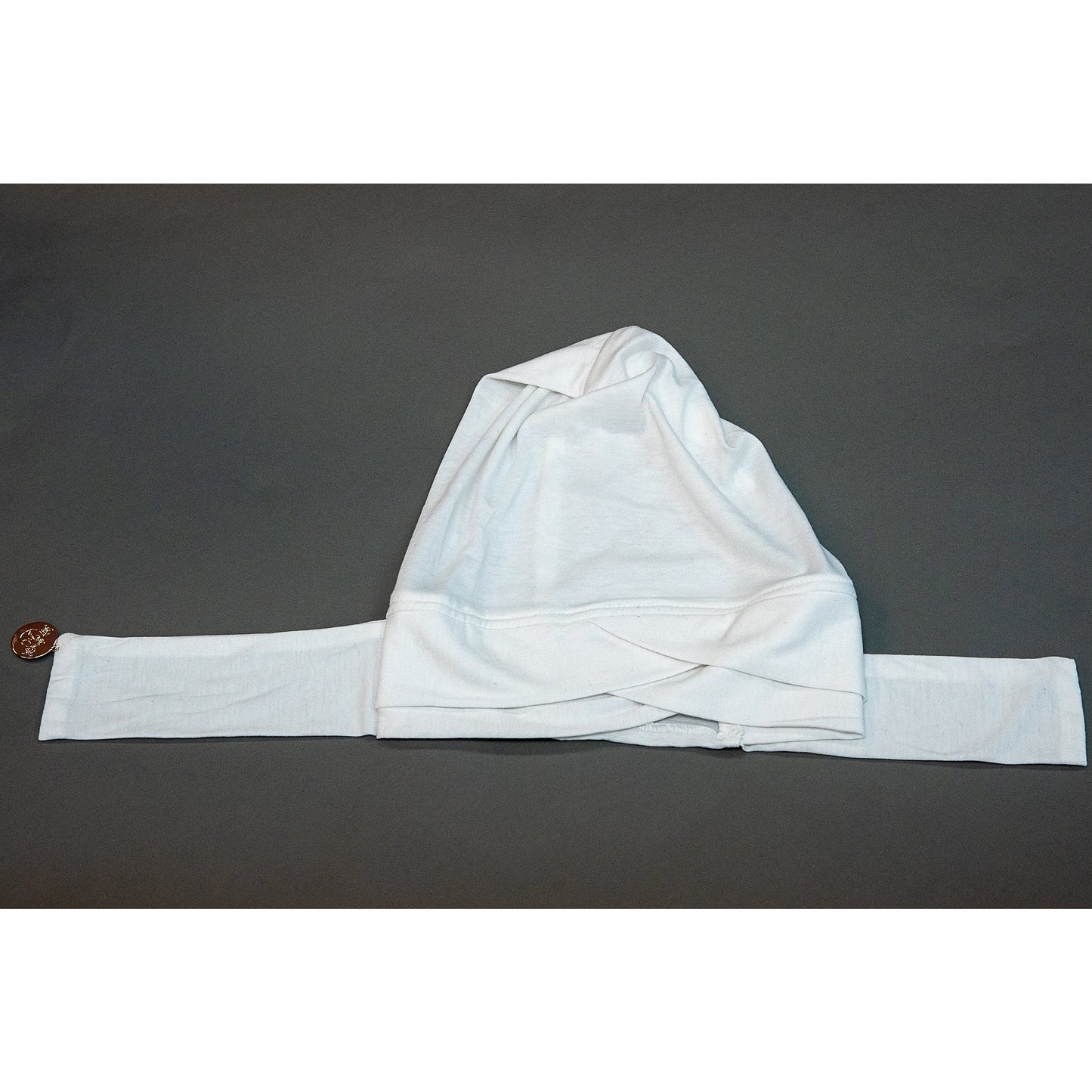 Criss Cross Cap- Snowy White - Modestia Collection is a Detroit scarf based brand with a curated for Detroiter's and to the eclectic style of scarf lovers around the globe.