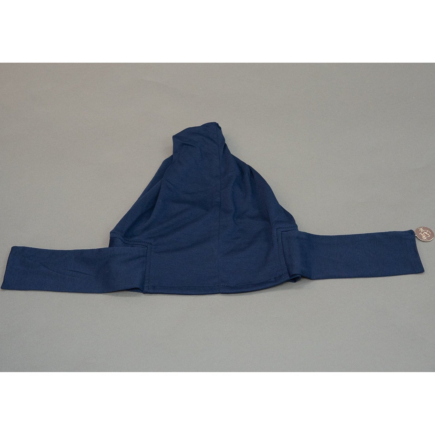 Criss Cross Tie-back Cap- Deep Sea Navy - Modestia Collection is a Detroit scarf based brand with a curated for Detroiter's and to the eclectic style of scarf lovers around the globe.