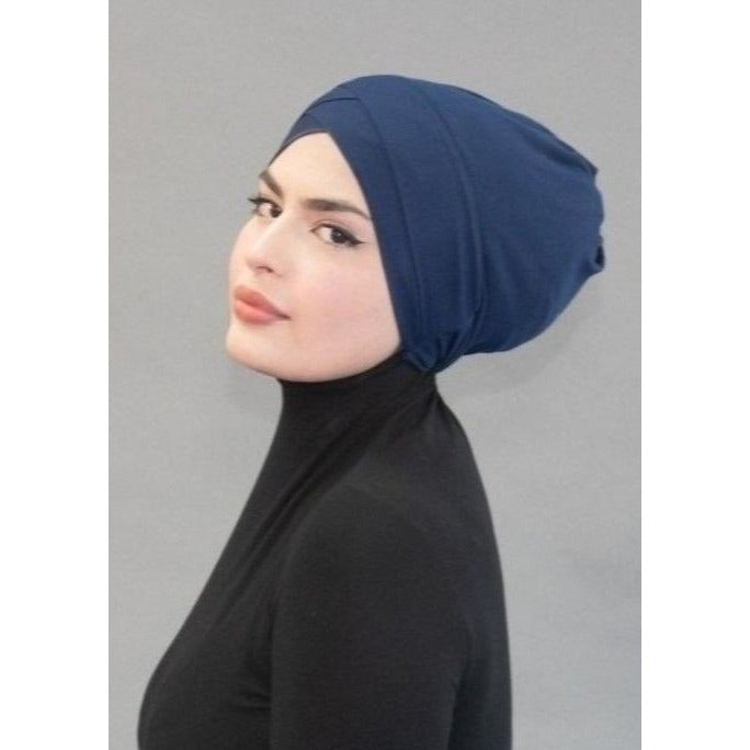 Criss Cross Tie-back Cap- Deep Sea Navy - Modestia Collection is a Detroit scarf based brand with a curated for Detroiter's and to the eclectic style of scarf lovers around the globe.