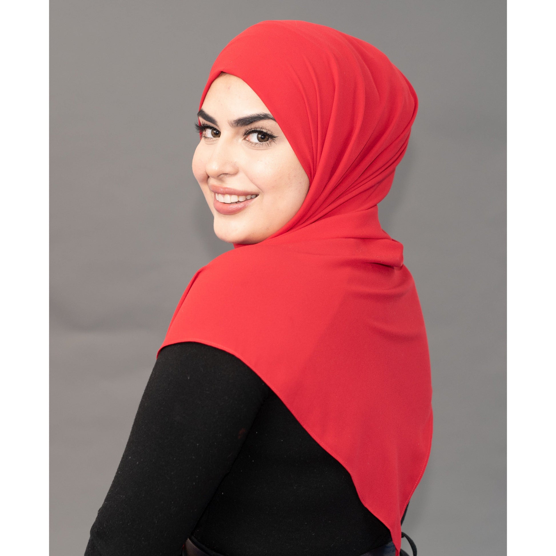 Limited Edition Gold Medallion Hijab / Scarf - Ferrari Red - Modestia Collection is a Detroit scarf based brand with a curated for Detroiter's and to the eclectic style of scarf lovers around the globe.